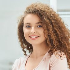 Smile Makeover Decisions: Front Teeth Crowns vs Veneers